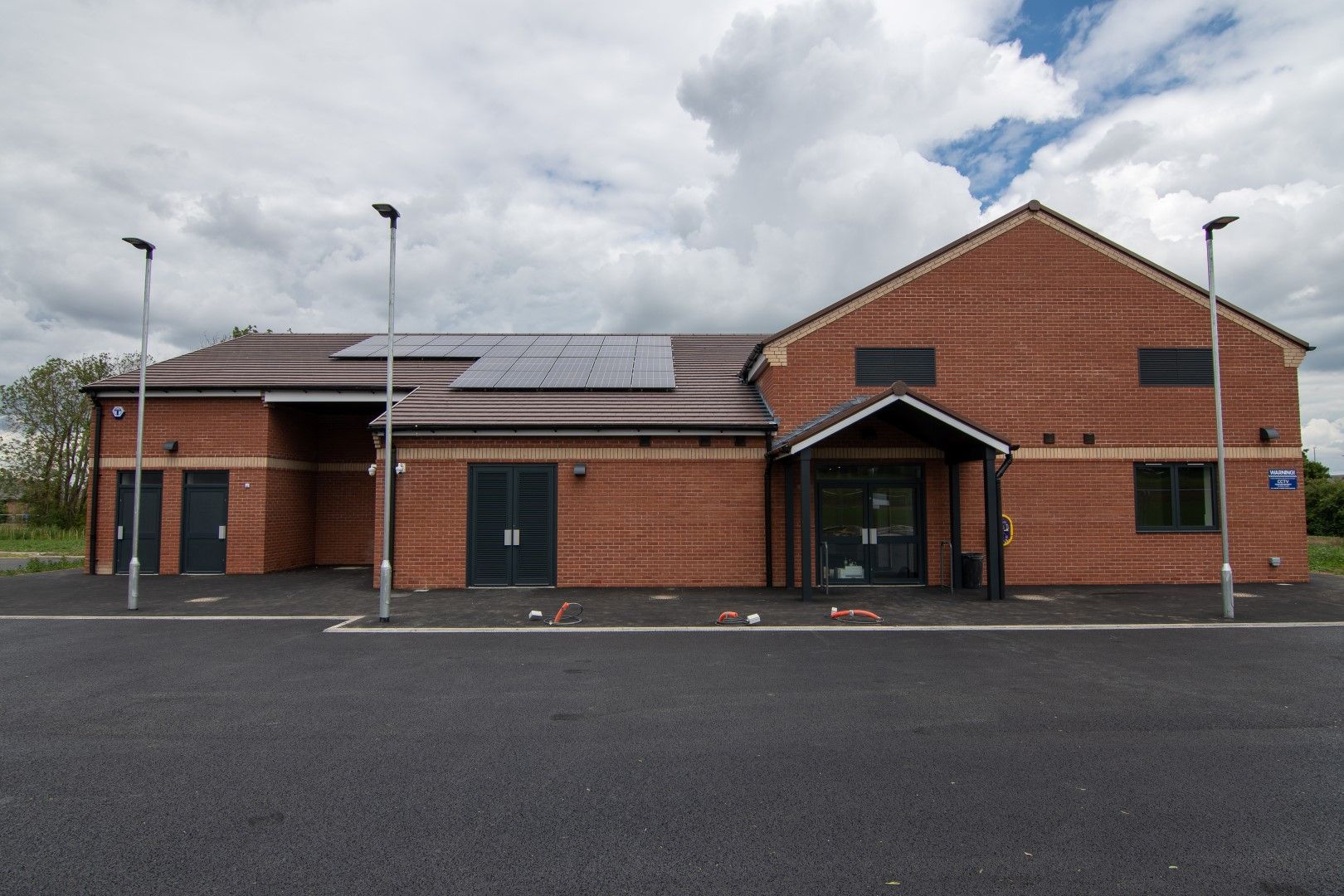 Wavendon Community Hub, a single-storey brick community building with solar panels